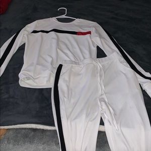 white, black, and red shirt/pants set